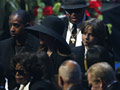 Matka ojciec oraz syn Michaela / fot. Mario Anzuoni / Reuters